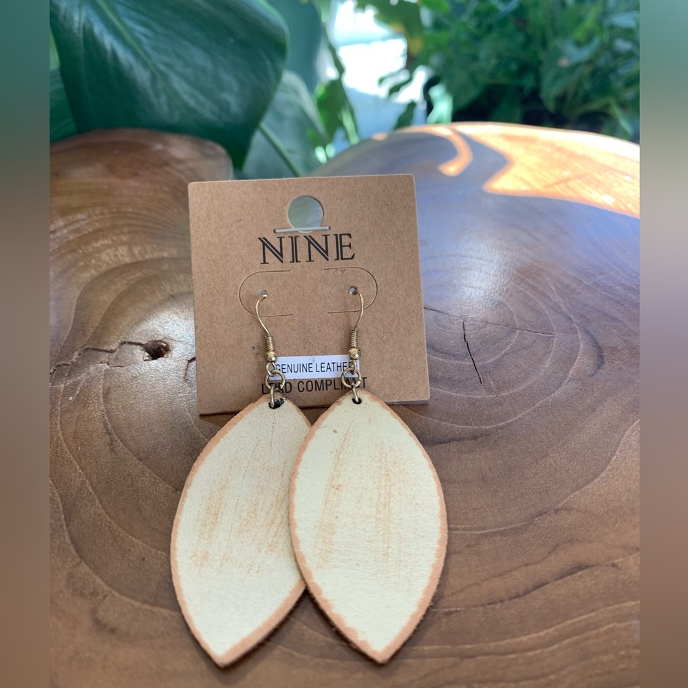 Genuine leather painted white leaf shaped earrings